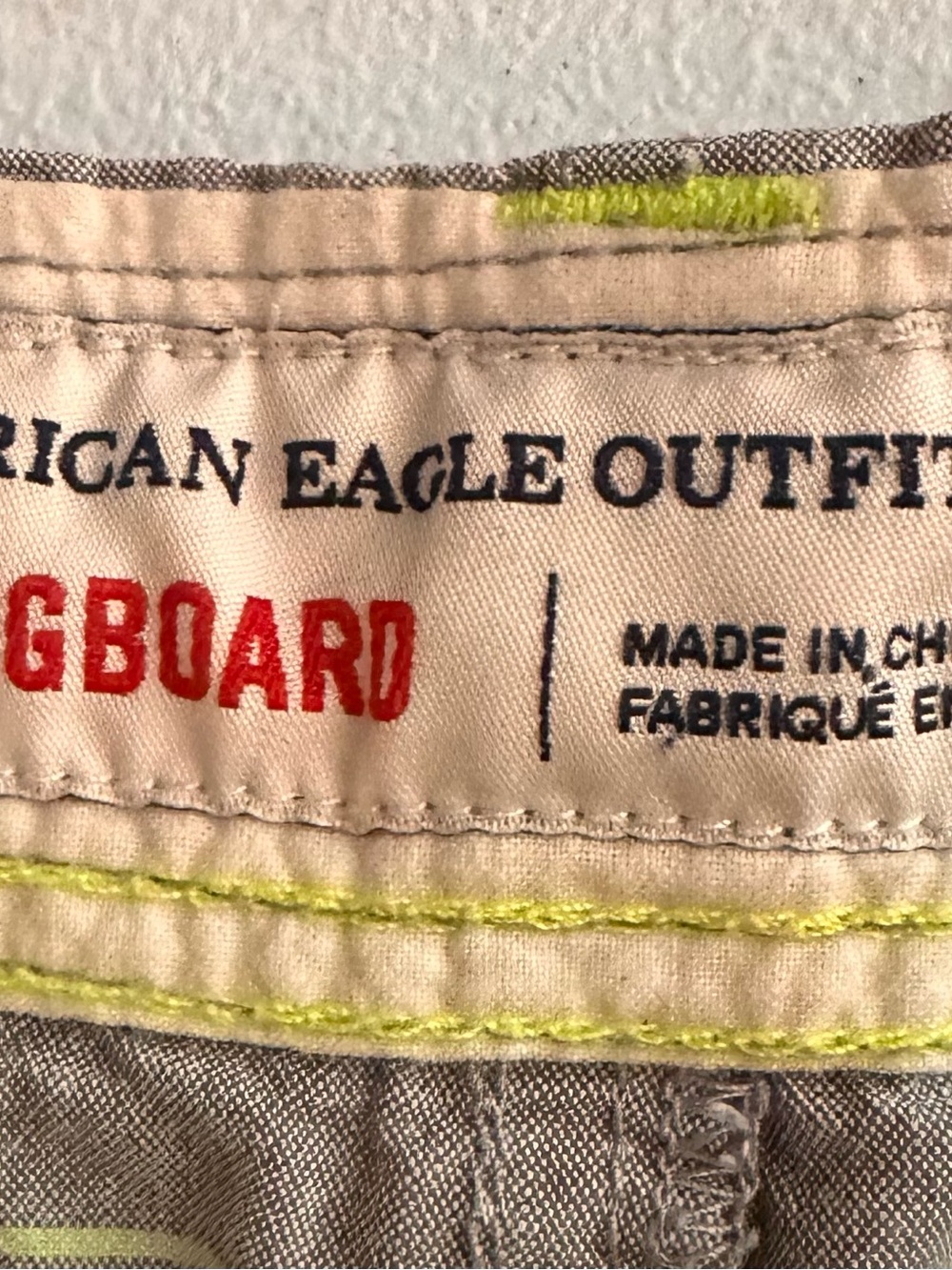 American Eagle Outfitters Tan Shorts with Neon Yellow Stitching